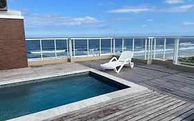 Apartamento pé na areia